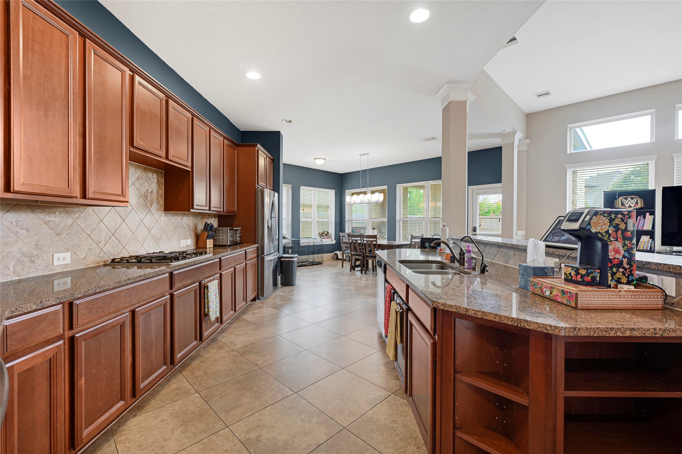 14002 Cole Point Drive Humble, TX 77396 - Photo 9 of 23 a large kitchen with cabinets