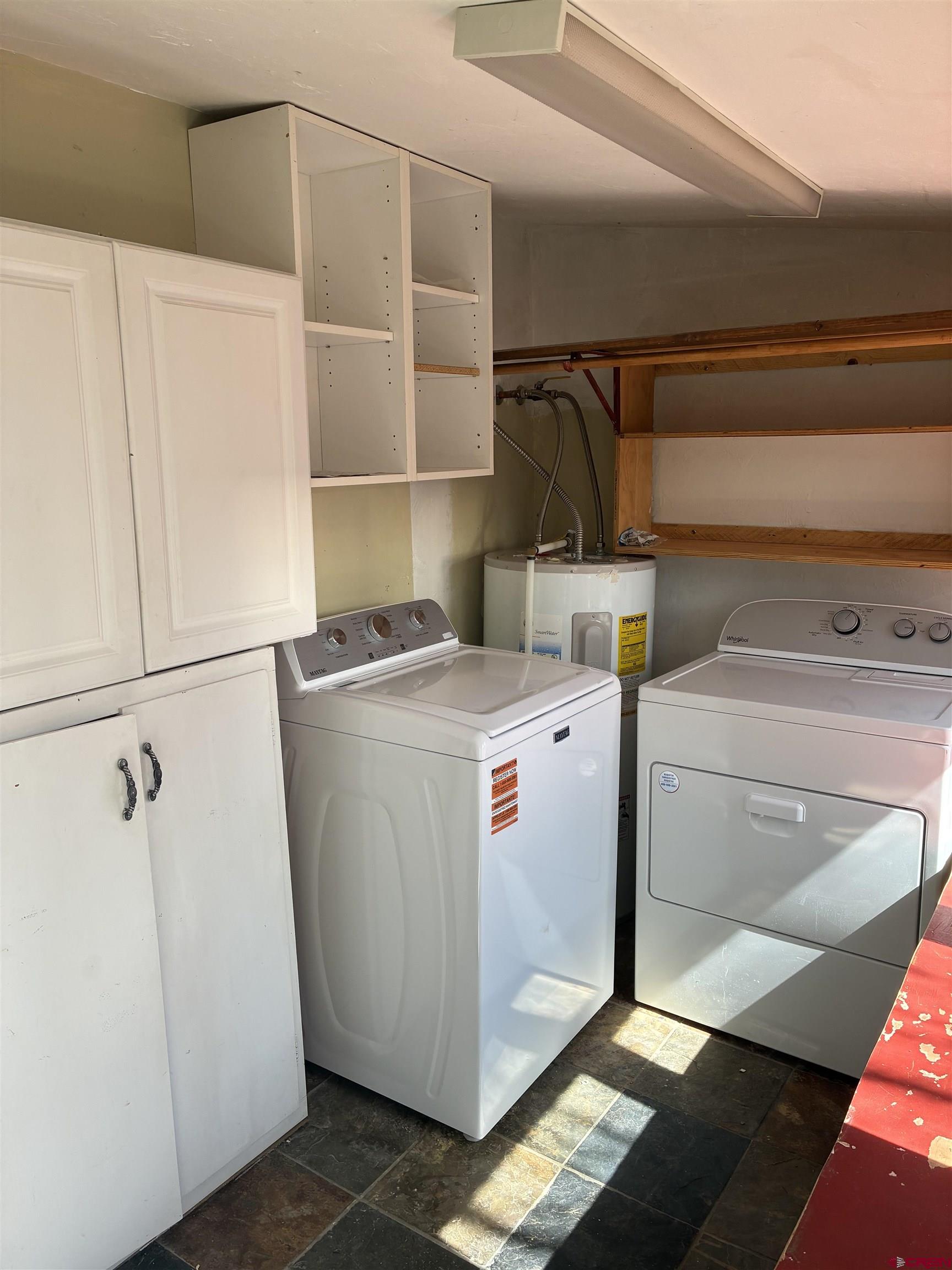 312 North Beech Street Cortez, CO 81321 - Photo 23 of 37 a utility room with dryer and washer