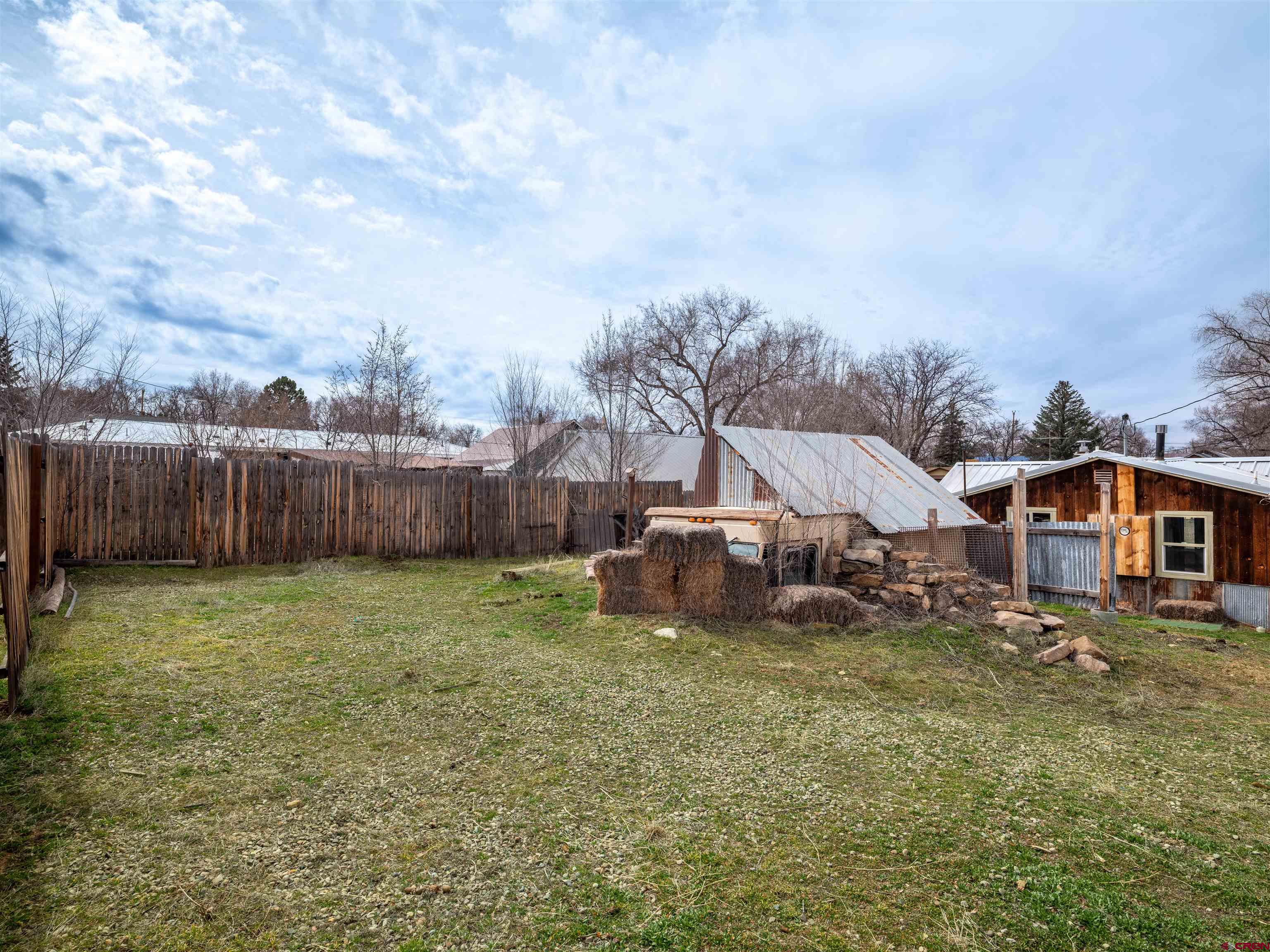 312 North Beech Street Cortez, CO 81321 - Photo 37 of 37 a view of a yard with wooden fence