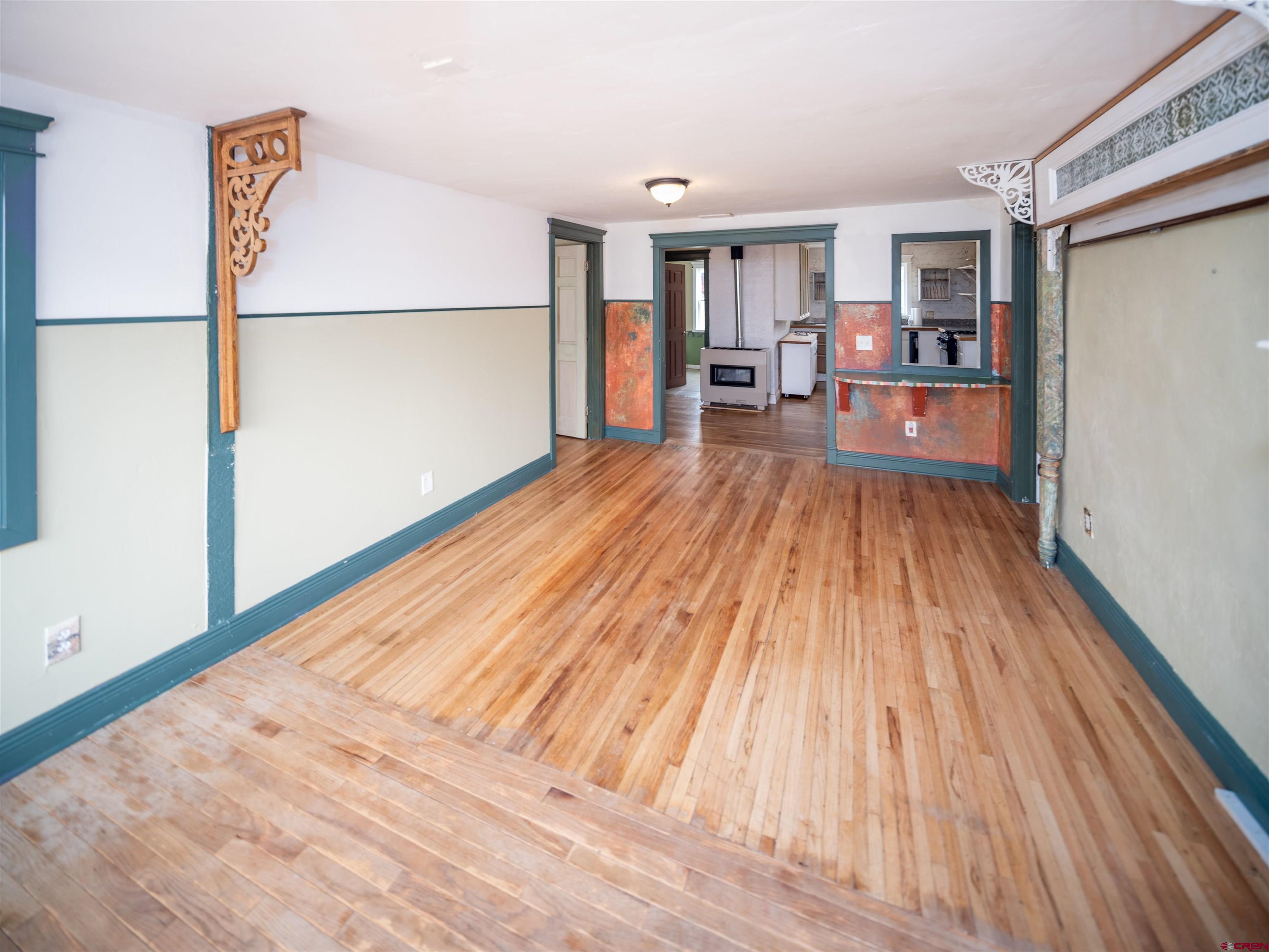 312 North Beech Street Cortez, CO 81321 - Photo 7 of 37 a view of a living room with wooden floor
