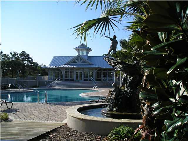 127 Grande Pointe Cir Inlet Beach Inlet Beach, FL 32461 - Photo 2 of 7 a house view with a garden space