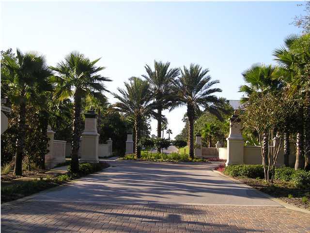 127 Grande Pointe Cir Inlet Beach Inlet Beach, FL 32461 - Photo 4 of 7 a view of a house with a yard and palm trees