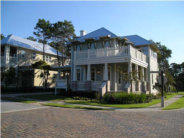 127 Grande Pointe Cir Inlet Beach Inlet Beach, FL 32461 - Photo 6 of 7 a front view of a house with a yard