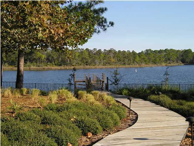 127 Grande Pointe Cir Inlet Beach Inlet Beach, FL 32461 - Photo 7 of 7 a view of a lake with a outdoor space