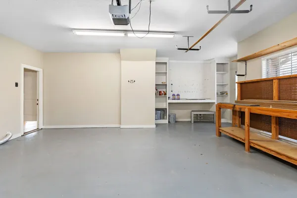 a view of an empty room with a fireplace