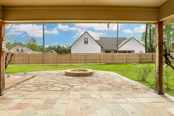 a view of swimming pool with a yard