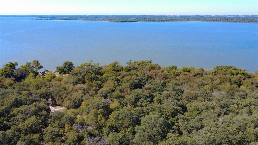 2301 Moseley Road Cross Roads, TX 76227 - Photo 14 of 14 a view of a large body of water with a building in the background