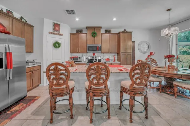 a view of kitchen with breakfast area