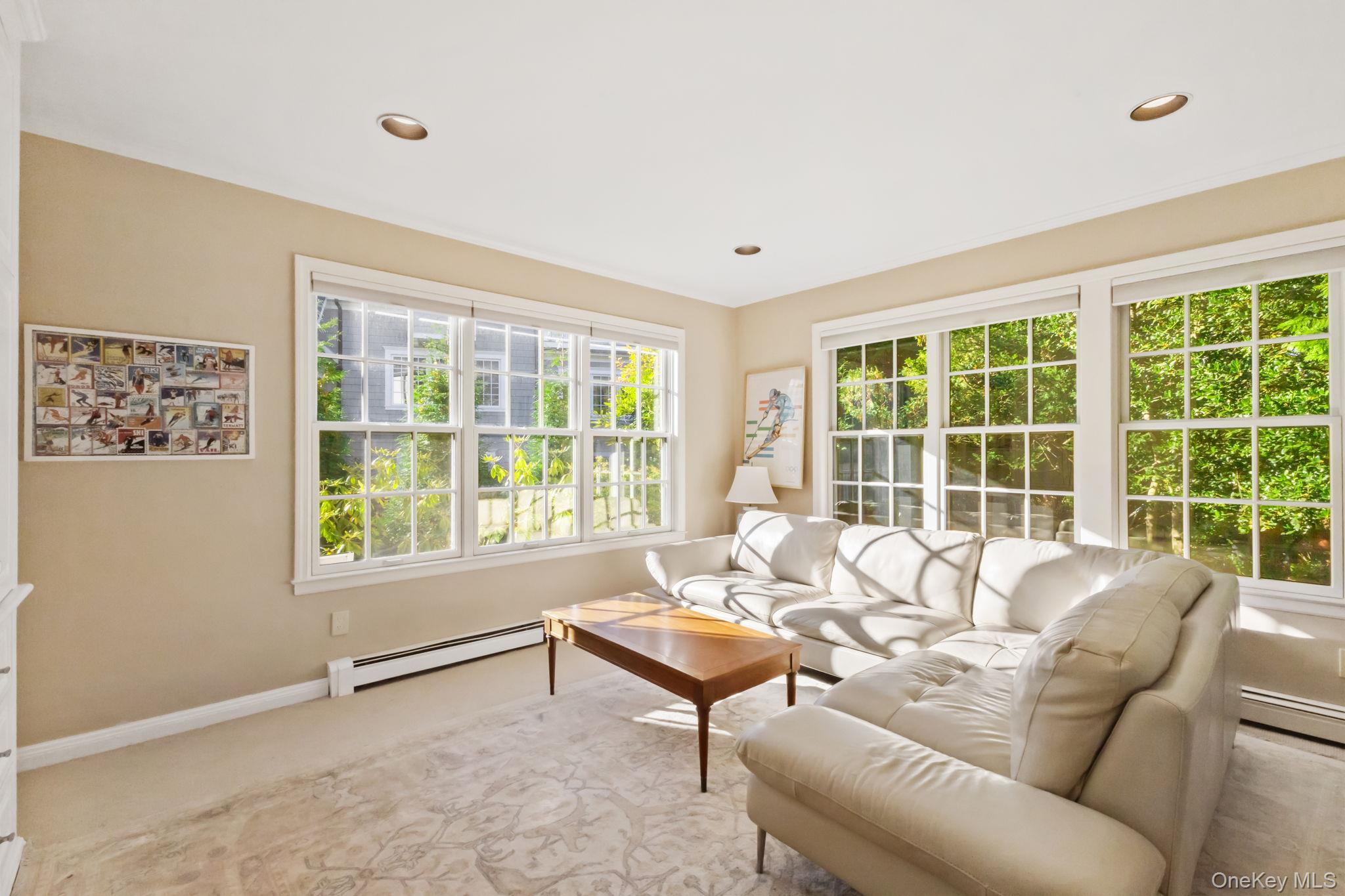 30 Studio Lane Bronxville, NY 10708 - Photo 20 of 30 a living room with furniture and a window