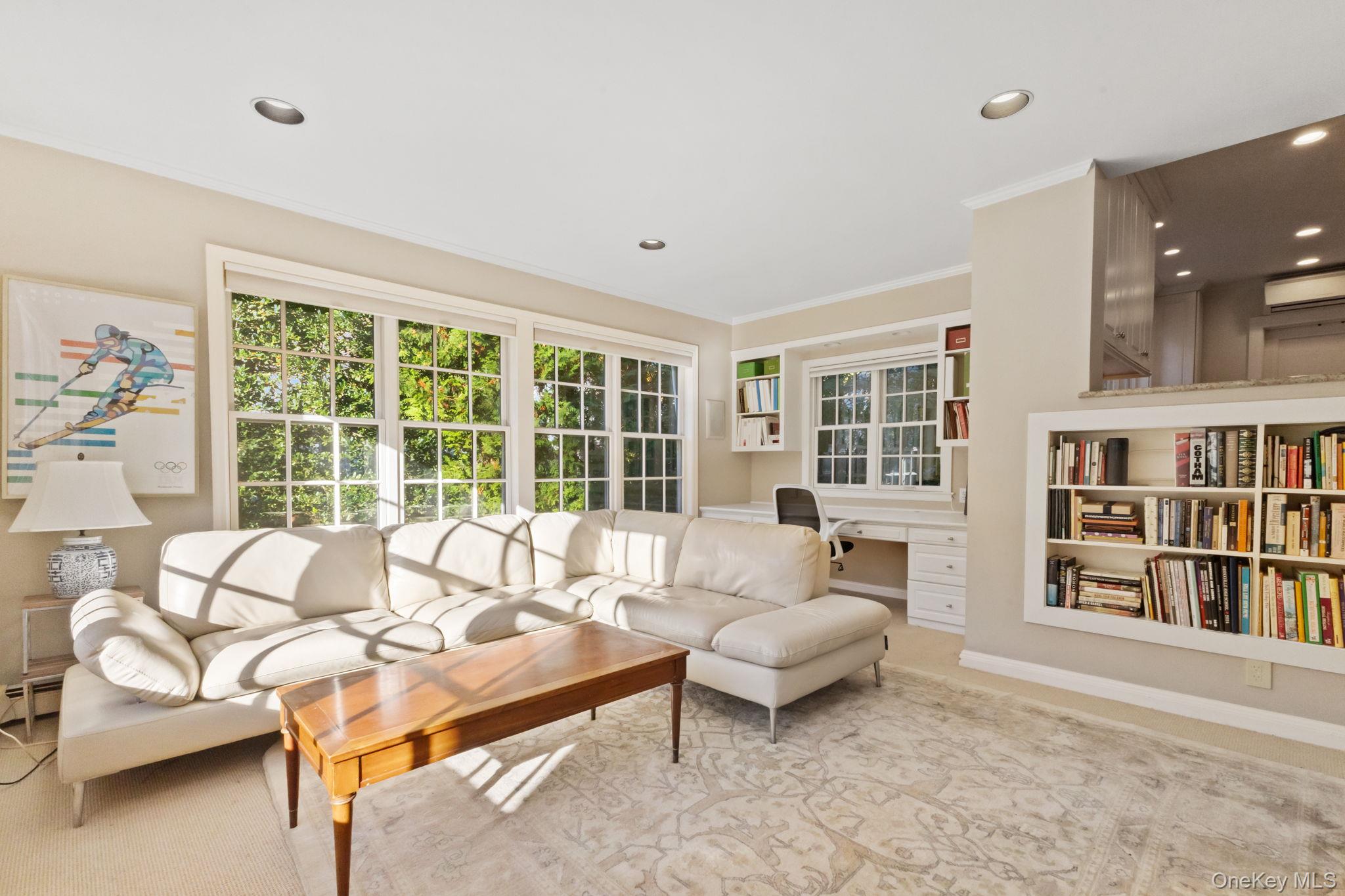 30 Studio Lane Bronxville, NY 10708 - Photo 21 of 30 a living room with furniture and a large window