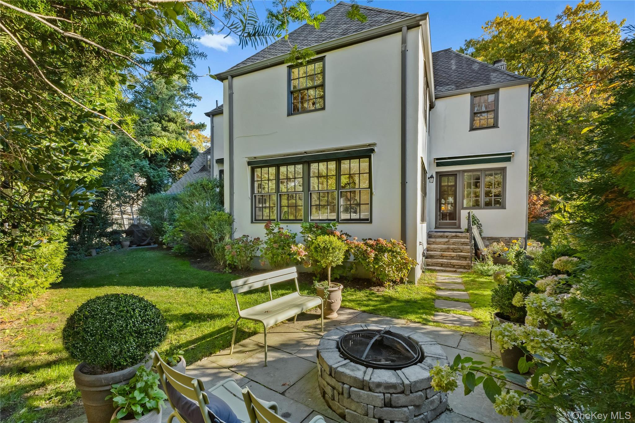 30 Studio Lane Bronxville, NY 10708 - Photo 29 of 30 a house with swimming pool in front of it