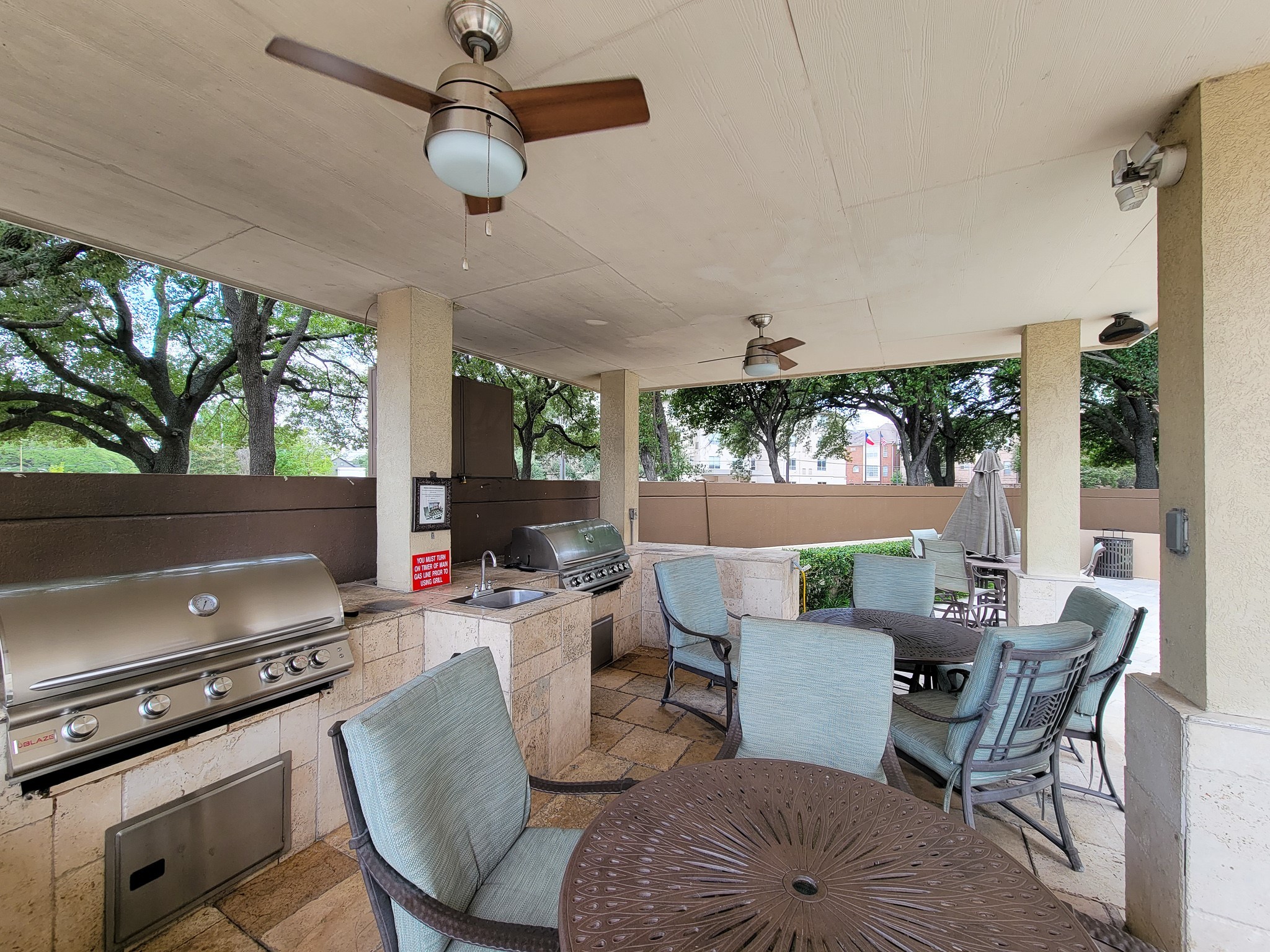 3525 Sage Road, Unit 303 Houston, TX 77056 - Photo 11 of 41 Covered Outdoor Kitchen, stainless steel grills, and sink! Are you ready to enjoy and or entertain?