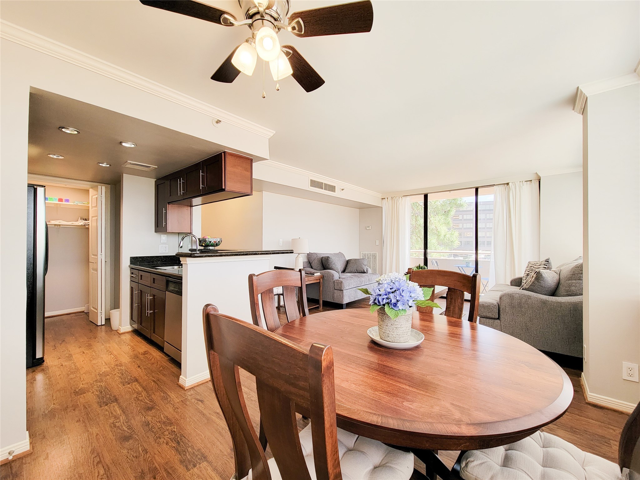 3525 Sage Road, Unit 303 Houston, TX 77056 - Photo 14 of 41 Overview of the space! Kitchen open to the Living room and easy access to the Dining area.