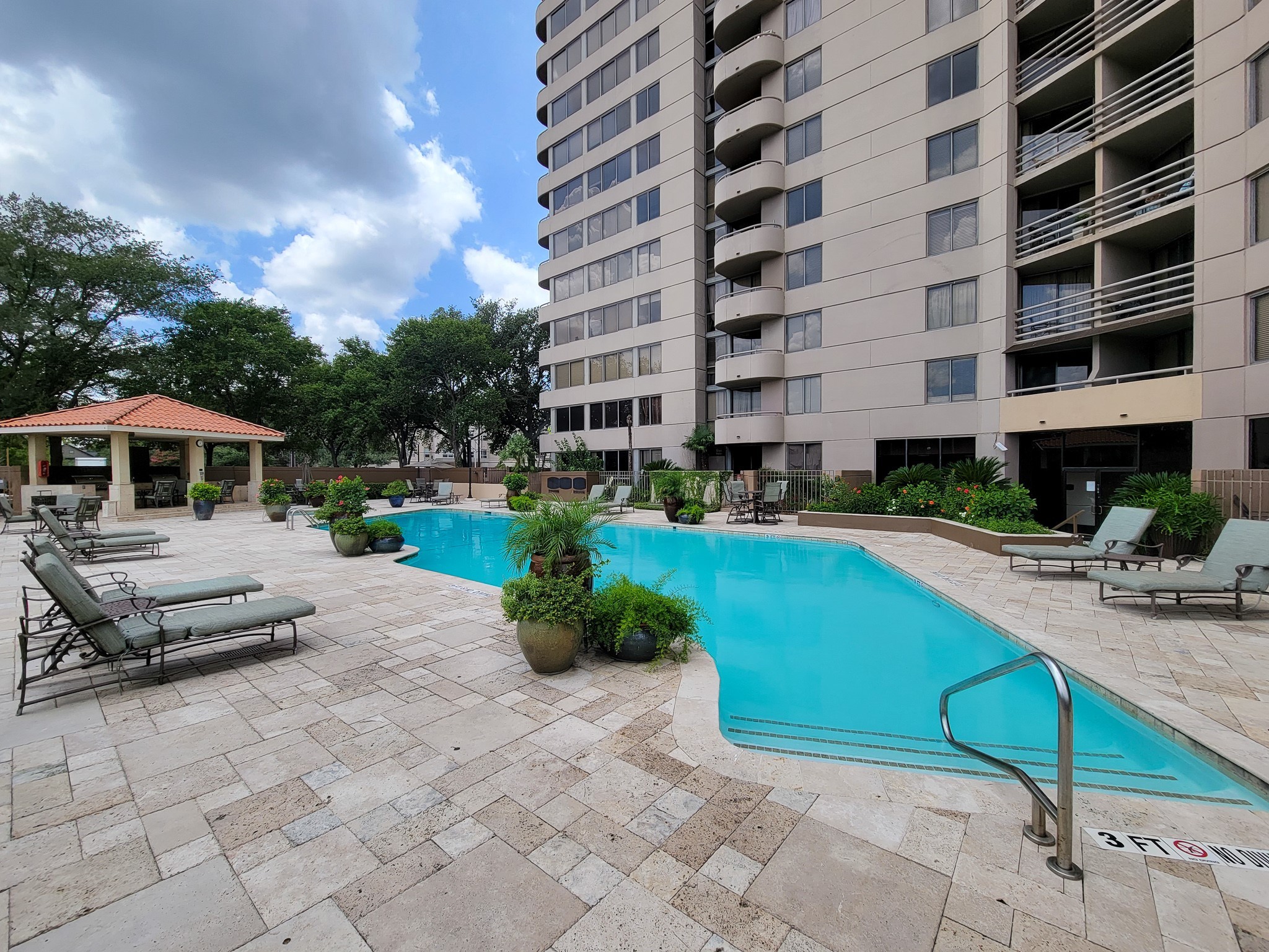 3525 Sage Road, Unit 303 Houston, TX 77056 - Photo 2 of 41 The resort feel of the Pool, Deck, and Outdoor Kitchen is so relaxing!