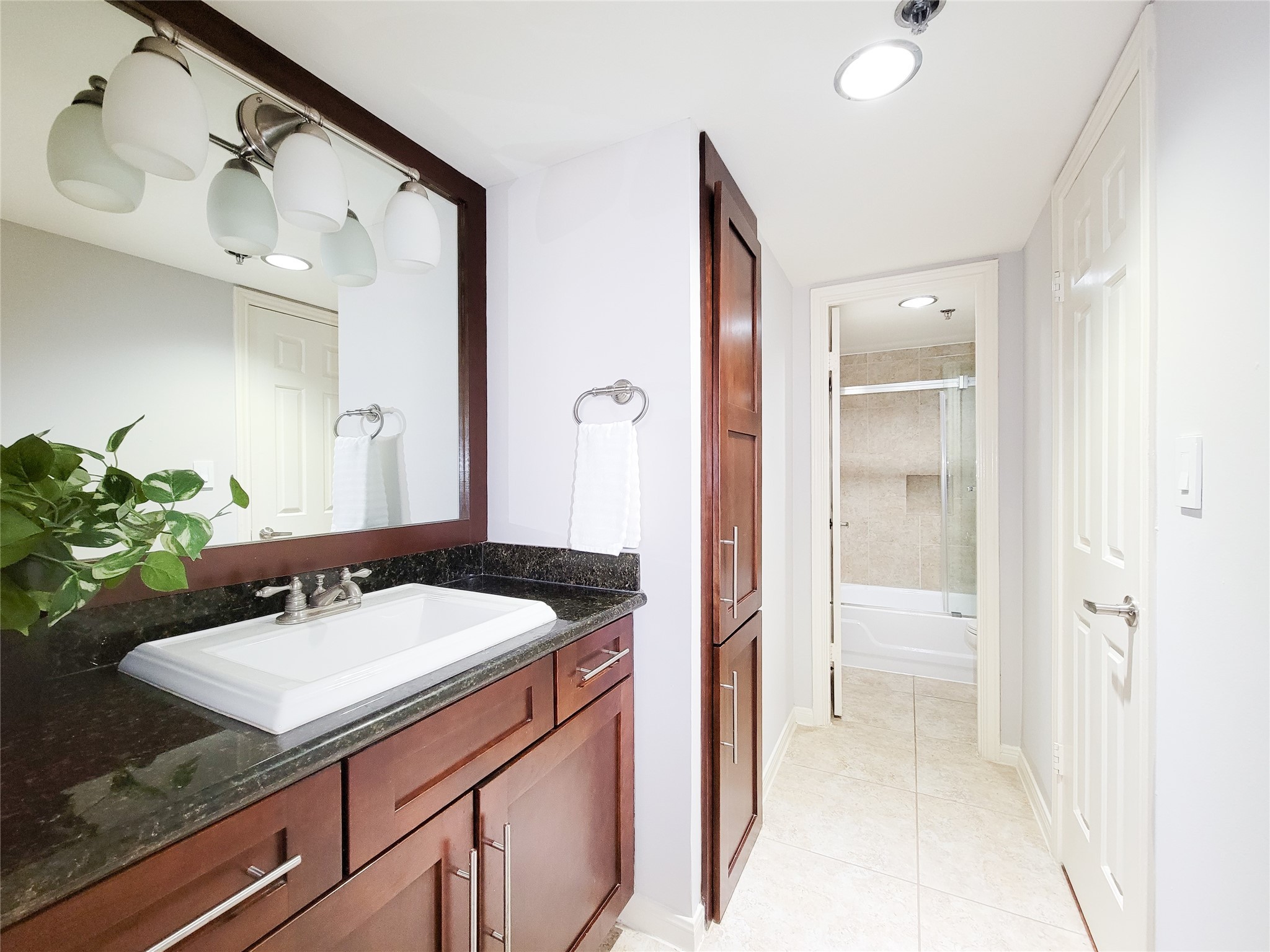 3525 Sage Road, Unit 303 Houston, TX 77056 - Photo 30 of 41 Vanity, linen closet and large walk-in closet. Toilets in both baths have been replaced.