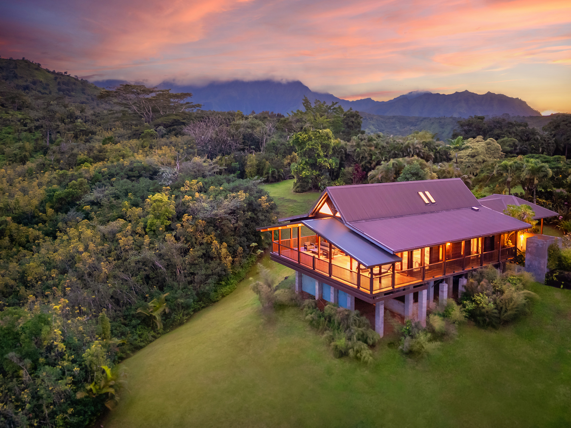 a swimming pool with mountain view in the background
