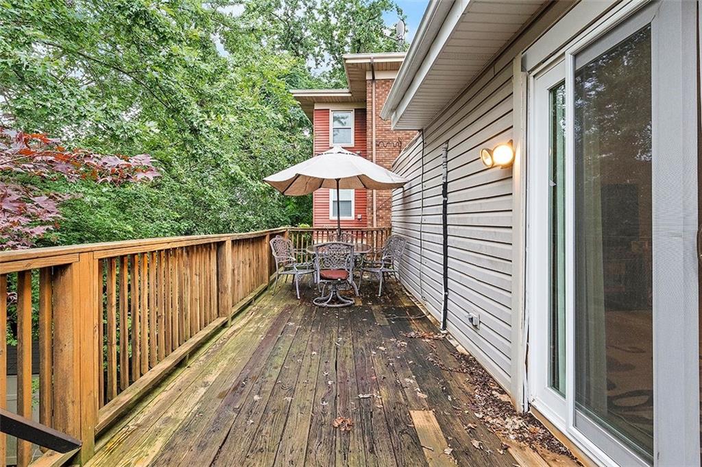 33 Radium Street Pittsburgh, PA 15214 - Photo 15 of 31 a view of a patio with wooden floor and furniture