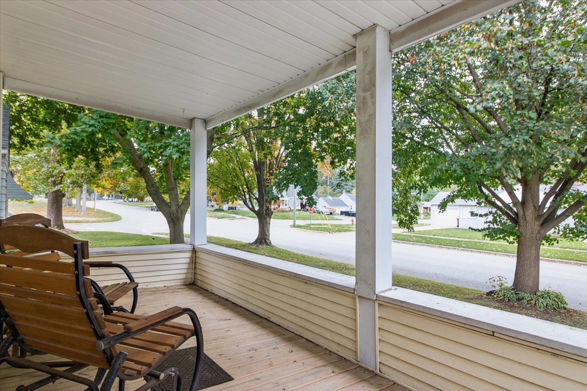 310 South Sycamore Street Genoa, IL 60135 - Photo 2 of 21 a view of a room with backyard and hardwood