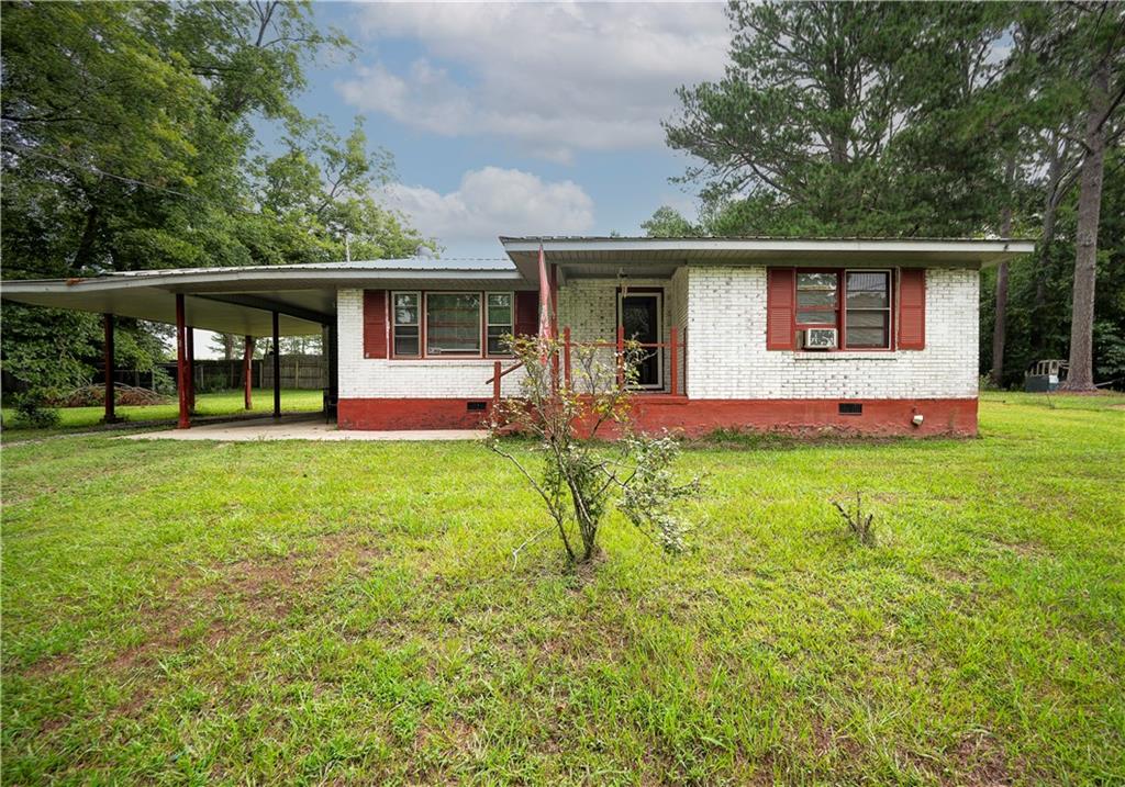 5 Green Acre Road Northeast Rome, GA 30165 - Photo 1 of 1 a front view of house with yard and green space