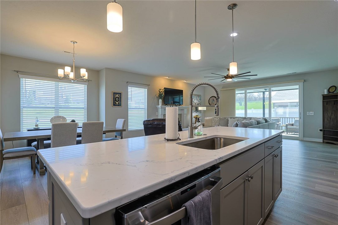 5013 Arena Court Hamilton, OH 45011 - Photo 13 of 41 This open concept living space features a modern kitchen island with ample counter space.