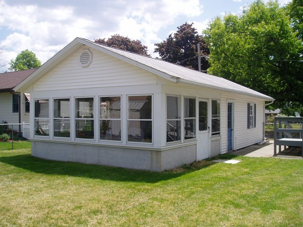 387 Granby Road Chicopee, MA 01013 - Photo 19 of 22 a view of a house with a yard and sitting area