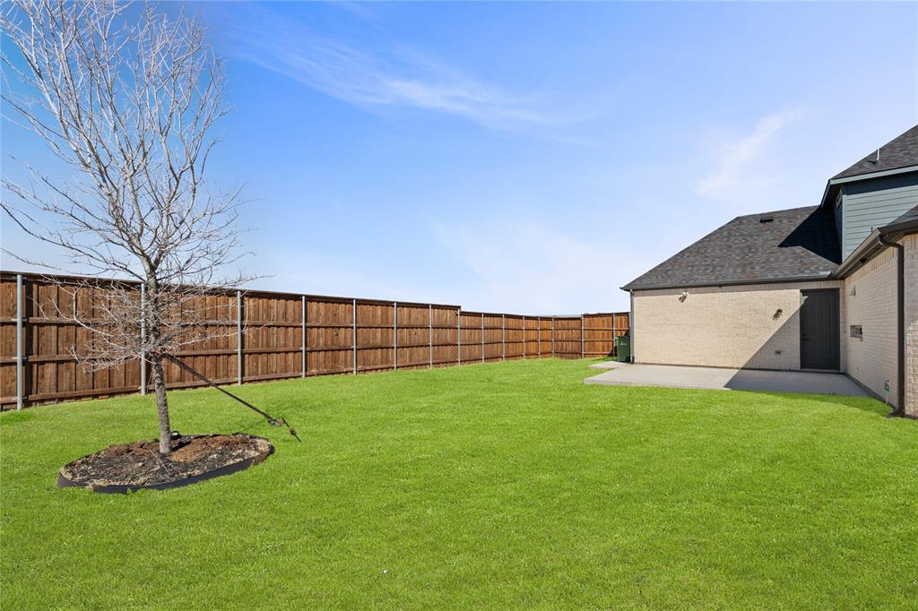 600 St Andrew Lane Prosper, TX 75078 - Photo 27 of 29 Fenced backyard with a patio