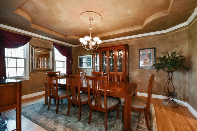 37W571 Grey Barn Road St. Charles, IL 60175 - Photo 11 of 31 a view of a dining room with furniture and chandelier
