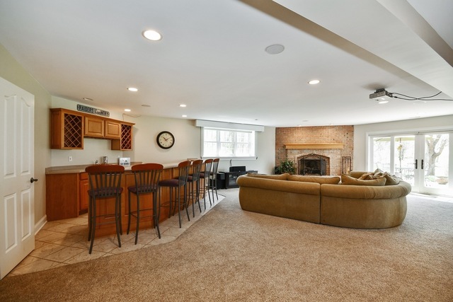 37W571 Grey Barn Road St. Charles, IL 60175 - Photo 18 of 31 a living room with furniture and a fireplace