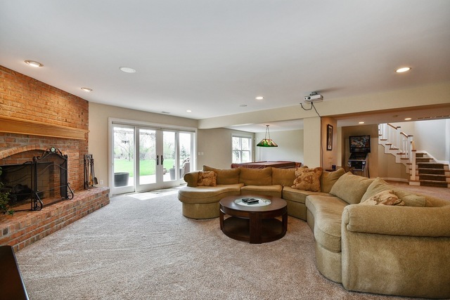 37W571 Grey Barn Road St. Charles, IL 60175 - Photo 19 of 31 a living room with furniture and a fireplace