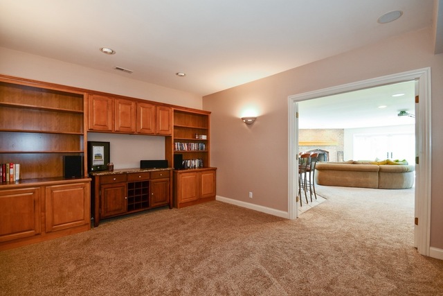 37W571 Grey Barn Road St. Charles, IL 60175 - Photo 21 of 31 a view of a kitchen with furniture and an empty room