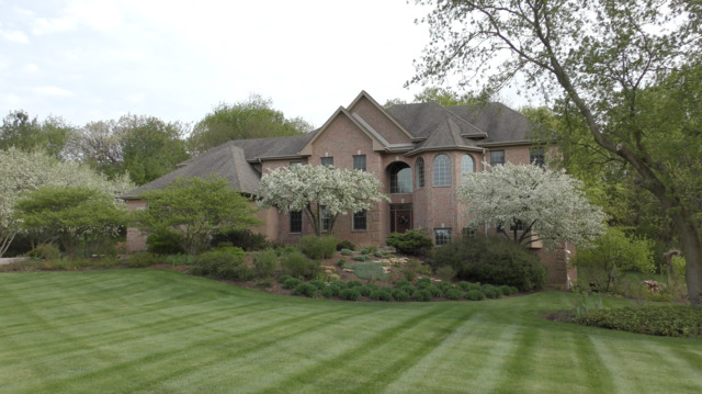 37W571 Grey Barn Road St. Charles, IL 60175 - Photo 25 of 31 a front view of a house with a yard