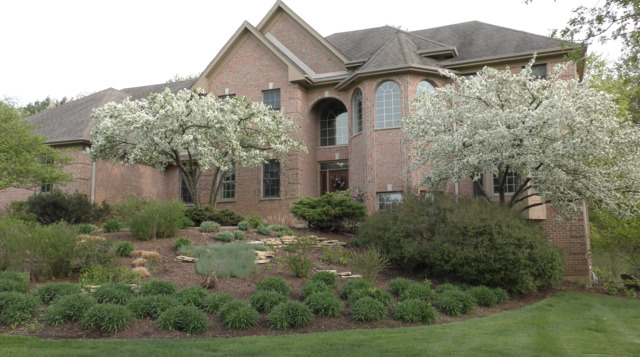 37W571 Grey Barn Road St. Charles, IL 60175 - Photo 26 of 31 a front view of a house with yard and green space
