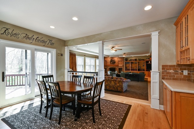 37W571 Grey Barn Road St. Charles, IL 60175 - Photo 6 of 31 a dining room with furniture wooden floor and a rug