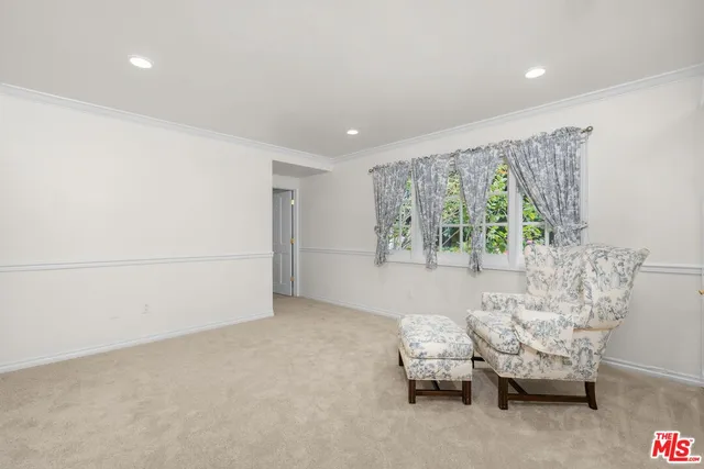 a room with furniture and a window