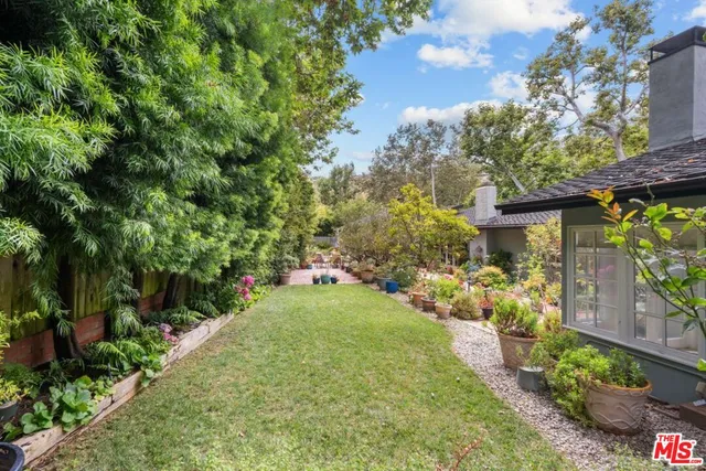 a view of a garden with a fountain