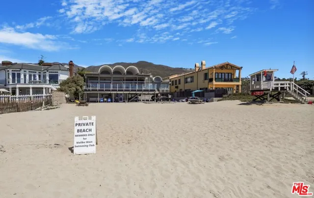 a view of a building with a yard
