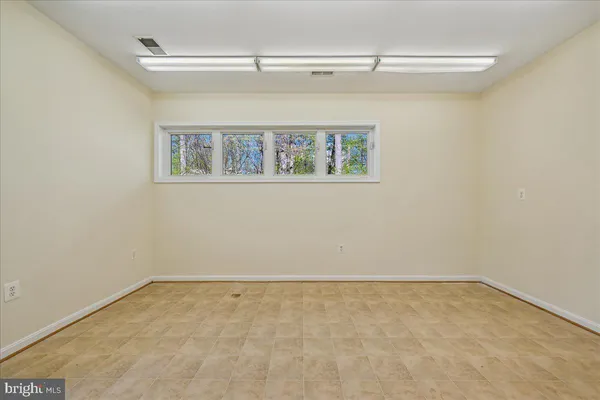 a view of a balcony with a potted plant