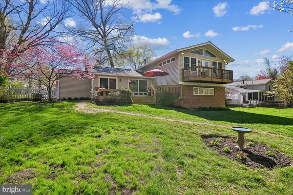 a view of outdoor space with sign board and garden