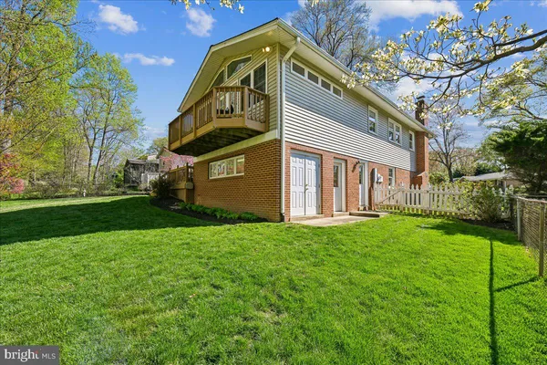 a view of a park with iron fence