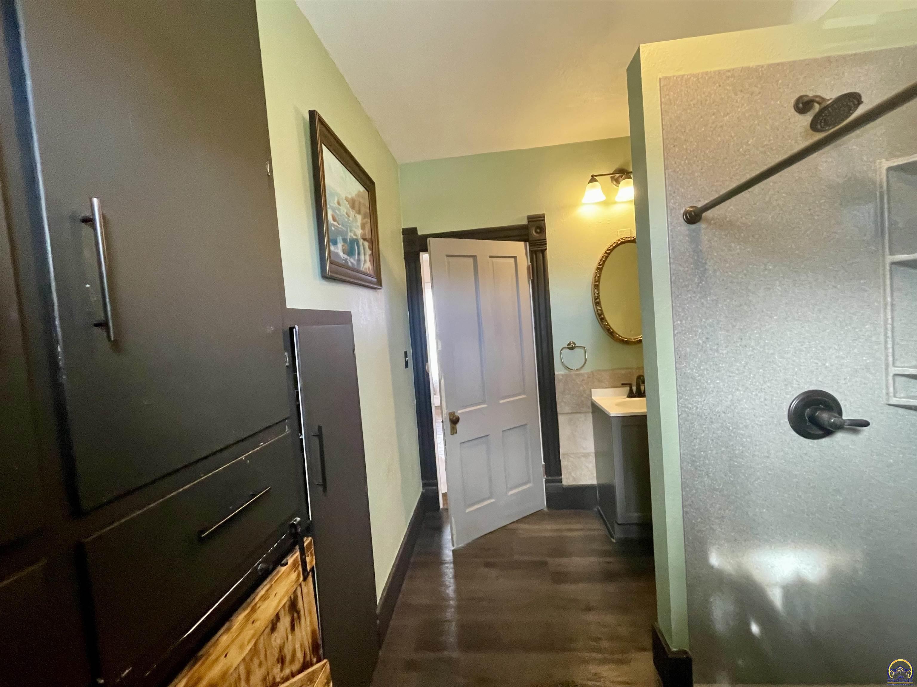 10134 Southwest Jordan Road Wakarusa, KS 66546 - Photo 13 of 36 Main Flr Bath View 2