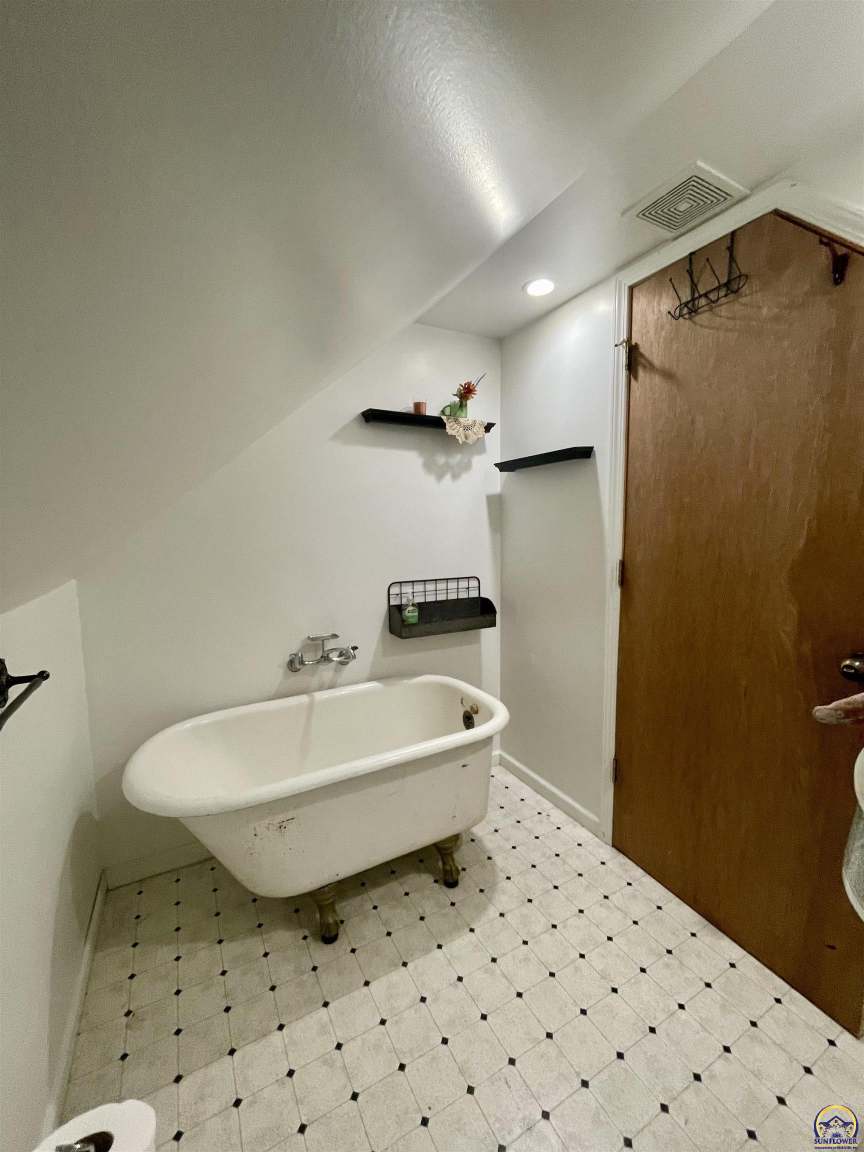 10134 Southwest Jordan Road Wakarusa, KS 66546 - Photo 22 of 36 Bathroom 2 Upstairs