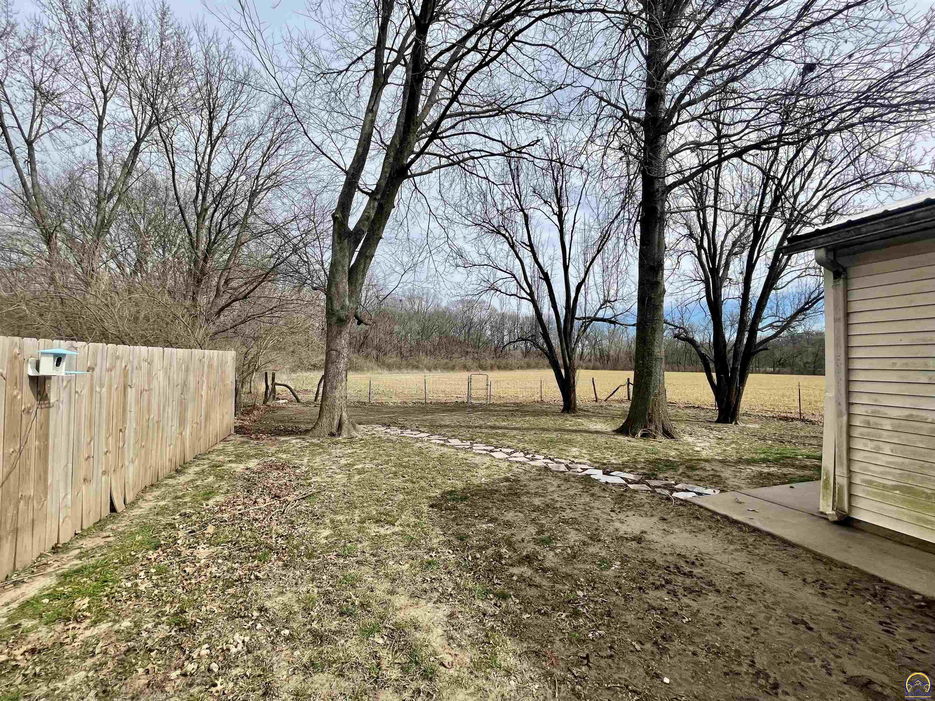 10134 Southwest Jordan Road Wakarusa, KS 66546 - Photo 32 of 36 Privacy Fenced on North Side