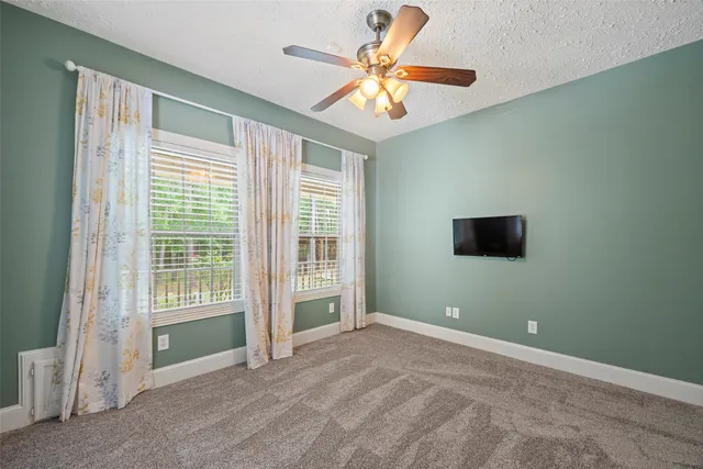 a view of front door and deck of the house