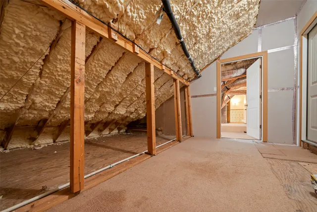 a view of a porch with wooden floor and outdoor space