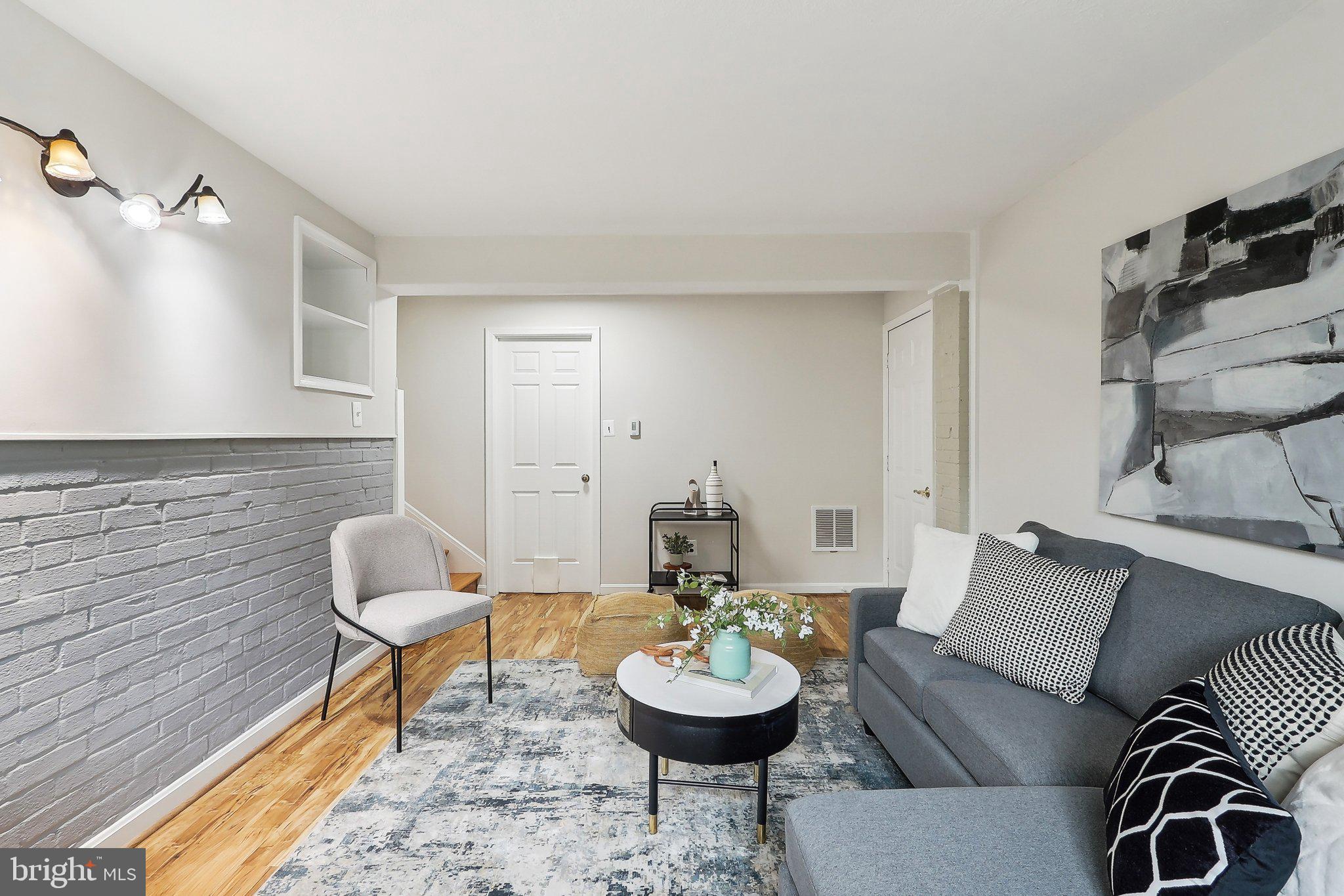 4212 Wakefield Drive Annandale, VA 22003 - Photo 24 of 67 a living room with furniture and a wooden floor