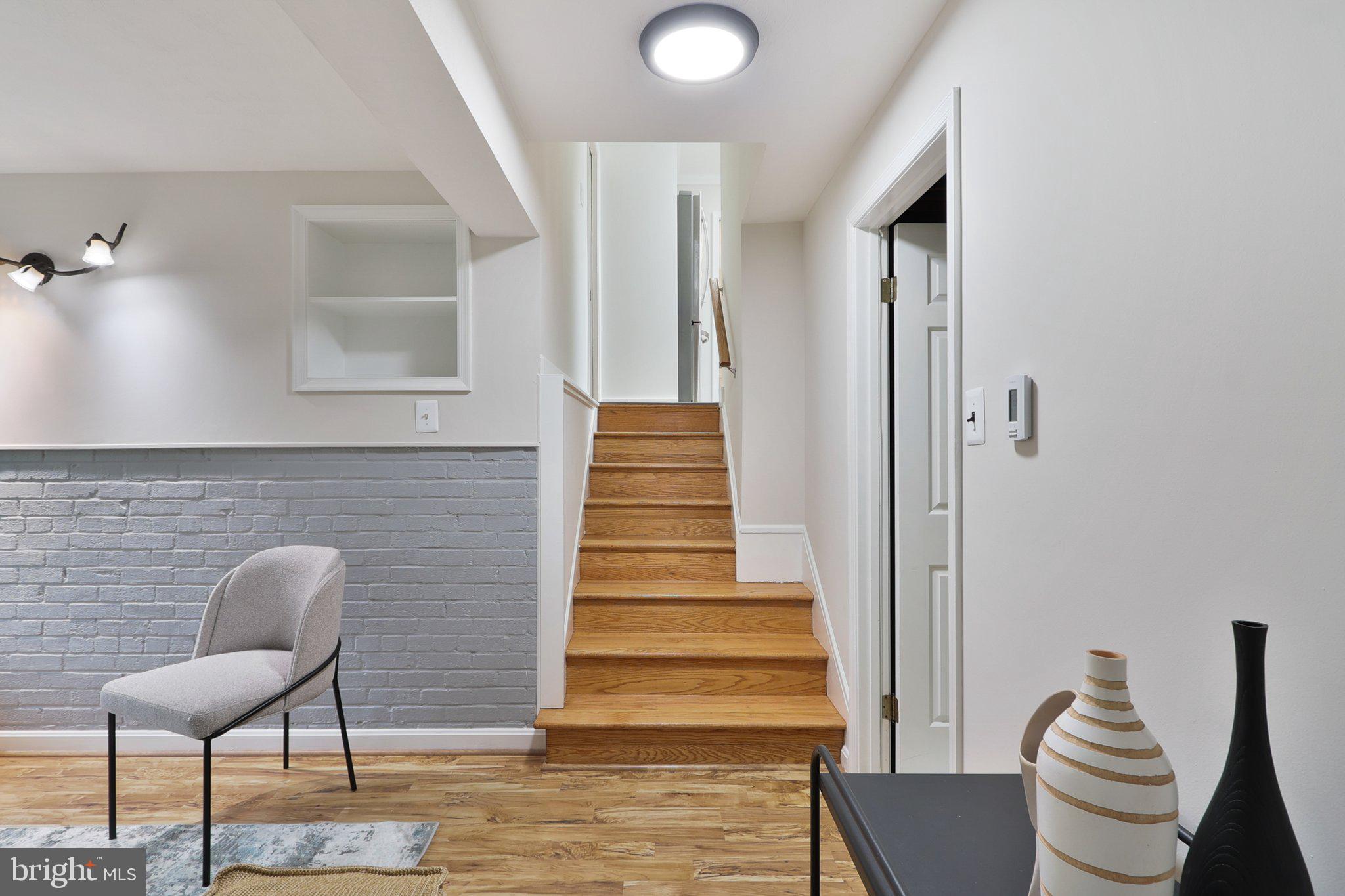 4212 Wakefield Drive Annandale, VA 22003 - Photo 26 of 67 a view of entryway and hall with wooden floor