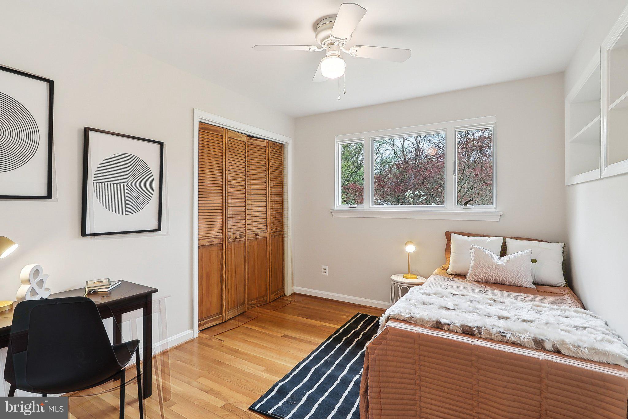 4212 Wakefield Drive Annandale, VA 22003 - Photo 29 of 67 a bedroom with a large bed and a window