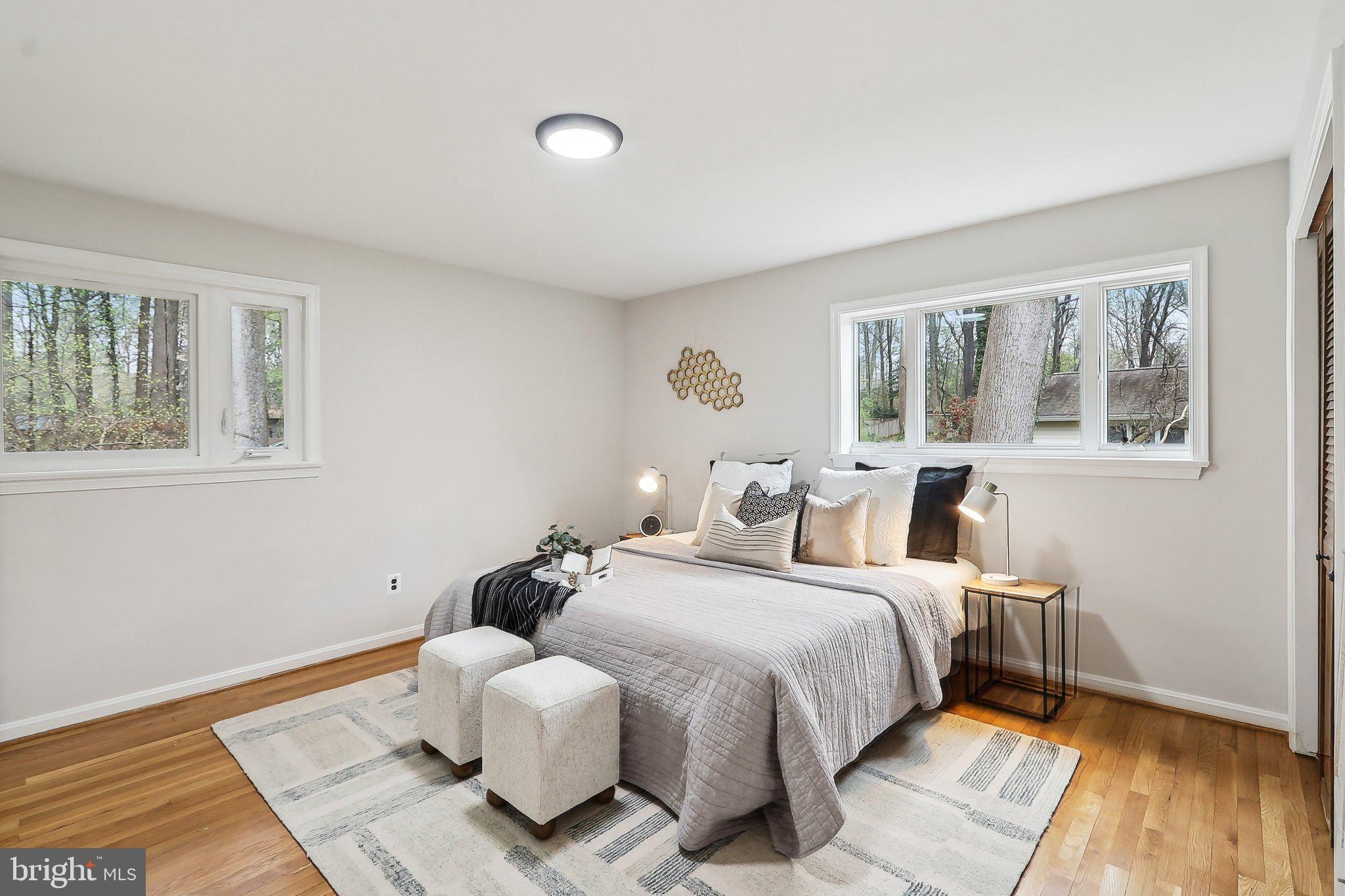 4212 Wakefield Drive Annandale, VA 22003 - Photo 35 of 67 a bedroom with a bed and wooden floor