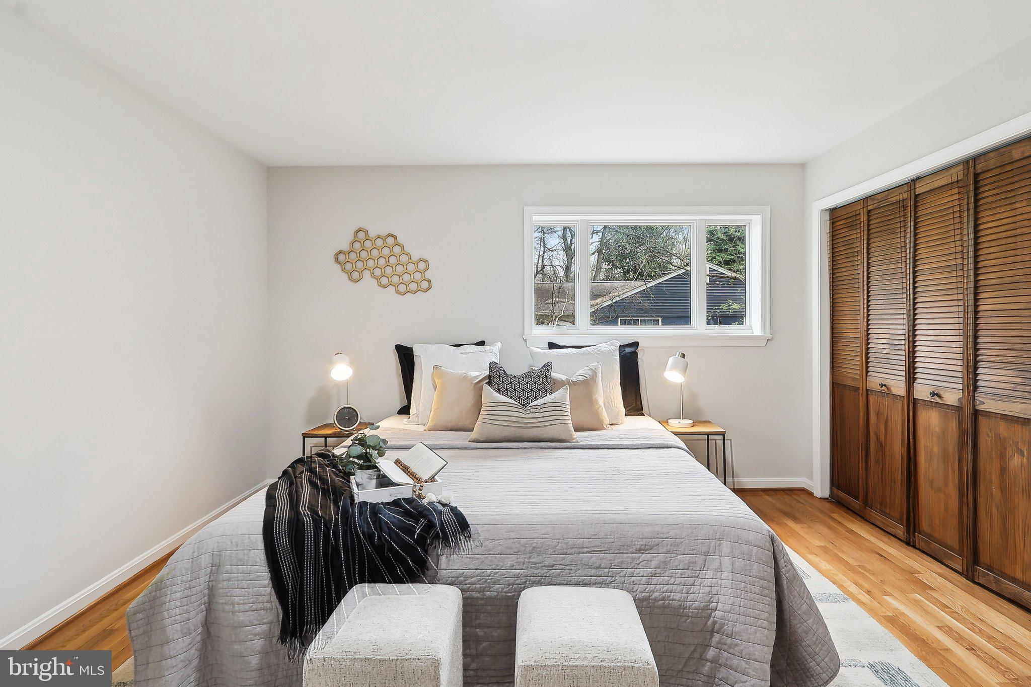 4212 Wakefield Drive Annandale, VA 22003 - Photo 40 of 67 a bedroom with a bed and wooden floor