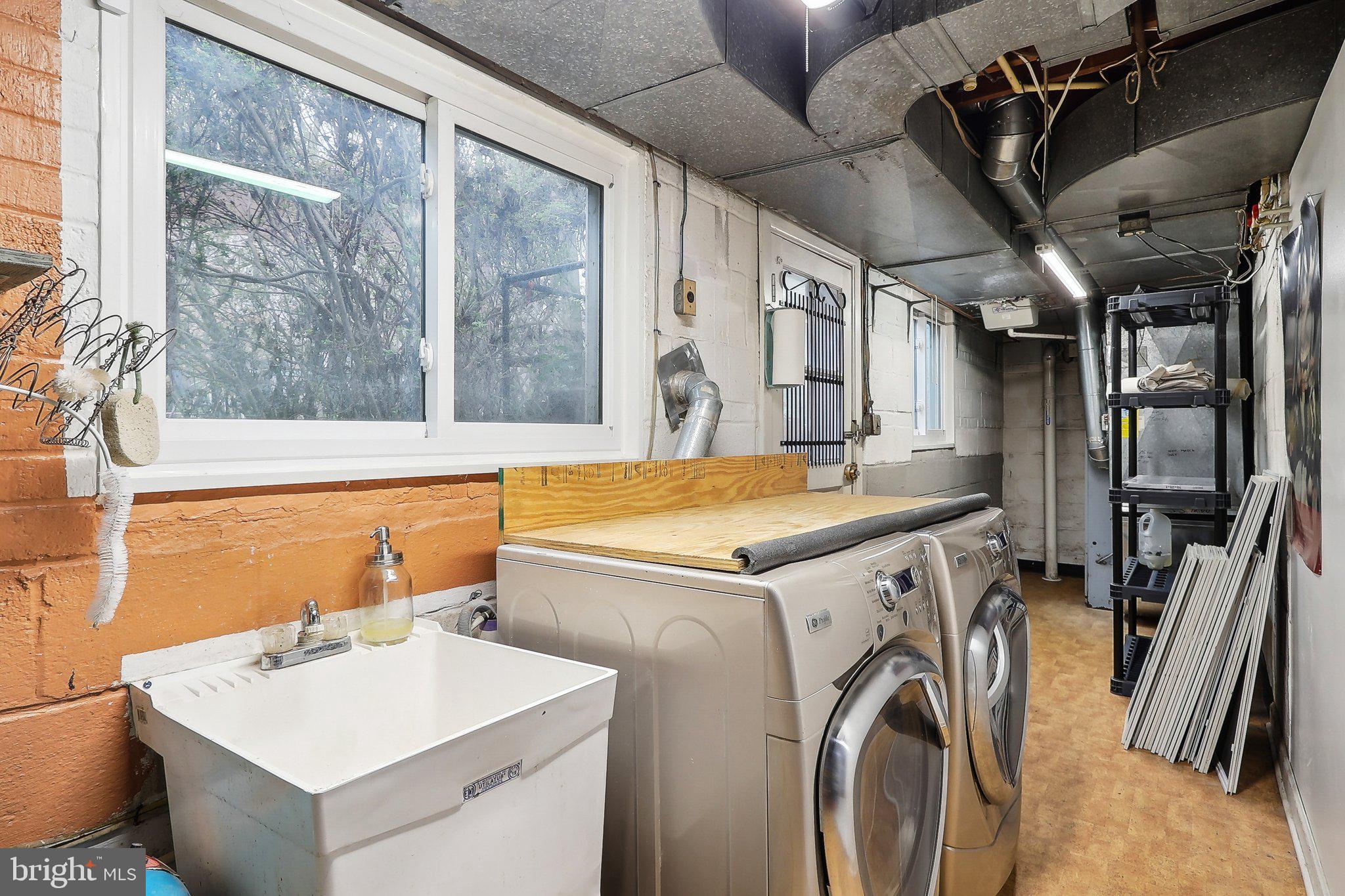 4212 Wakefield Drive Annandale, VA 22003 - Photo 43 of 67 a utility room with dryer and washer